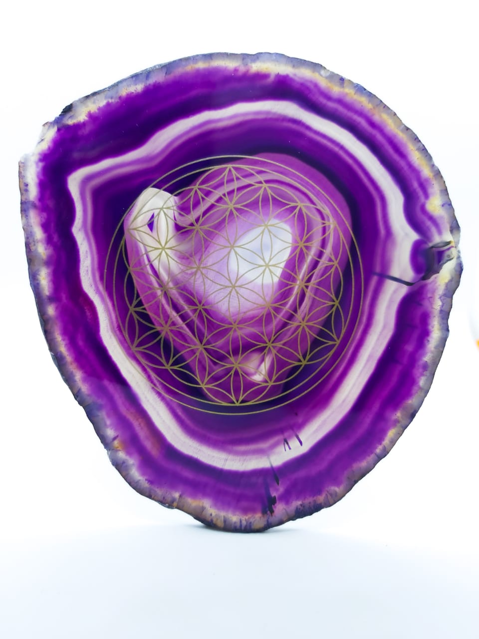 Flower of life on a natural shape agate gemstone